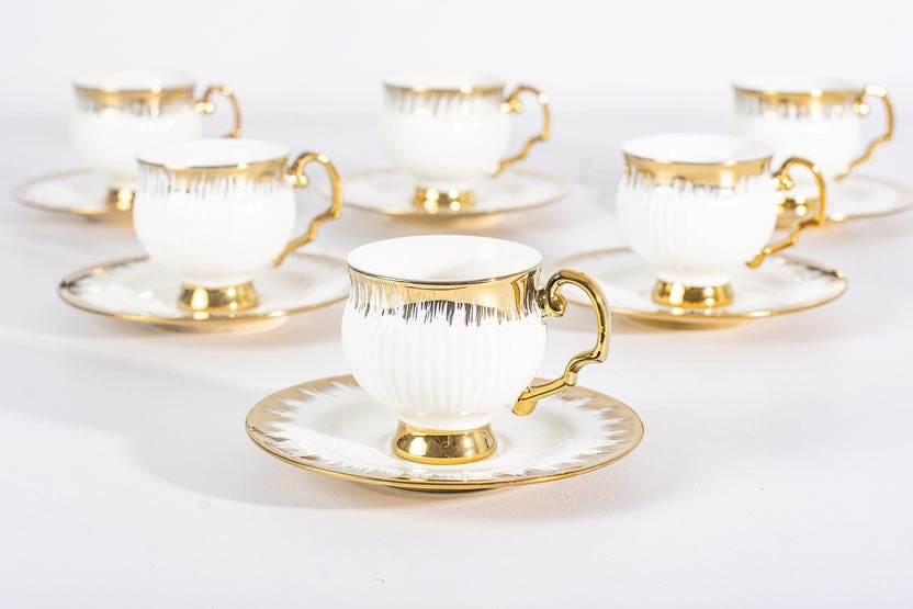 Service café noir doré avec pied 